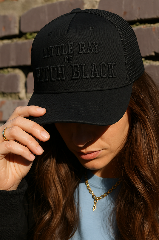 Little Ray of PITCH BLACK Trucker Hat | Otto